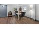 Dining room featuring luxury vinyl plank flooring and stylish furnishings at 2005 Gillespie Ave, Sarasota, FL 34234