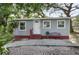 Charming single-story home with a well-maintained exterior and landscaped yard at 2005 Gillespie Ave, Sarasota, FL 34234
