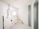 A bright utility room features a window, white walls, and modern fixtures and electrical panel at 211 22Nd Street Ne Ct, Bradenton, FL 34208