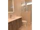 Modern bathroom featuring a walk-in shower, vanity and new fixtures at 2110 Michele Dr, Sarasota, FL 34231