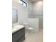 Modern bathroom with glass shower and vanity sink at 2110 Michele Dr, Sarasota, FL 34231