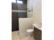Modern bathroom featuring a walk-in shower and stylish fixtures at 2110 Michele Dr, Sarasota, FL 34231