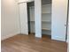 A walk-in closet that features ample storage, shelving, and hanging space at 2110 Michele Dr, Sarasota, FL 34231