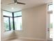 Bedroom with a modern window and hardwood floors at 2110 Michele Dr, Sarasota, FL 34231