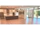 Modern kitchen featuring a large island, stainless steel appliances, and contemporary design at 2110 Michele Dr, Sarasota, FL 34231