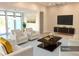 Inviting living room with elegant decor, comfortable seating, and a large window at 2110 Michele Dr, Sarasota, FL 34231