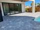 Patio featuring stone pavers and views of the pool at 2110 Michele Dr, Sarasota, FL 34231