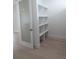 Bedroom featuring white shelving and a frosted glass door at 2110 Michele Dr, Sarasota, FL 34231