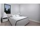 Bright bedroom with a large window, featuring neutral tones and clean lines at 2221 Wood St, Sarasota, FL 34237