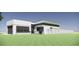 Modern home featuring a sleek design, attached garage, privacy fence and a well-manicured lawn at 2221 Wood St, Sarasota, FL 34237