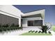 Modern home exterior showcasing sleek lines, decorative elements, and manicured landscaping at 2221 Wood St, Sarasota, FL 34237