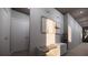 Hallway showcasing modern artwork, design elements, and neutral color palette at 2221 Wood St, Sarasota, FL 34237