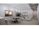 Open-plan living area featuring modern furnishings and large windows for plenty of natural light at 2221 Wood St, Sarasota, FL 34237