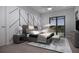 Tastefully decorated bedroom with modern furnishings and a view of the private pool area at 2221 Wood St, Sarasota, FL 34237