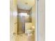 Bathroom with glass shower, tile floors, and granite countertops at 23136 Langdon Ave, Port Charlotte, FL 33954
