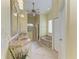 Elegant bathroom featuring double sinks, a soaking tub, and a separate shower, offering a spa-like experience at 23136 Langdon Ave, Port Charlotte, FL 33954