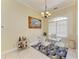 Cozy dining room with glass table, chandelier and modern decorative touches at 23136 Langdon Ave, Port Charlotte, FL 33954