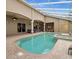 Enjoy this property's large in-ground pool and hot tub in the private, screened-in backyard at 2518 Dick Wilson Dr, Sarasota, FL 34240