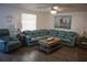 Cozy living room with comfortable seating, natural light, and appealing decor at 3167 Pinetree St, Port Charlotte, FL 33952