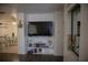 Bright living room showing entertainment center leading to a dining area at 3167 Pinetree St, Port Charlotte, FL 33952