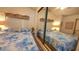 This comfortable bedroom features a queen bed and mirrored closet at 3333 26Th E Ave # 1023, Bradenton, FL 34208