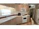 Well-equipped kitchen featuring ample counter space, modern appliances, and convenient access to the dining area at 3333 26Th E Ave # 1023, Bradenton, FL 34208