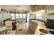 Bright and airy living space with a well-equipped kitchen and comfortable seating, designed for easy living and entertainment at 3333 26Th E Ave # 1023, Bradenton, FL 34208