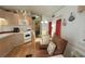 Inviting living space blending kitchen, dining, and seating areas with warm tones, creating a cozy atmosphere at 3333 26Th E Ave # 1023, Bradenton, FL 34208