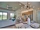 Open-concept kitchen, dining and living area filled with modern decor and expansive windows at 350 Bucknell Rd, Venice, FL 34293