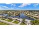 Expansive aerial view of beautiful community, showcasing the picturesque waterfront homes and waterway at 3615 Tripoli Blvd, Punta Gorda, FL 33950