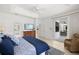 Comfortable main bedroom features access to the lanai and a connecting door to the en-suite bathroom at 3615 Tripoli Blvd, Punta Gorda, FL 33950