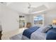 Spacious main bedroom with sliding doors that lead to the pool area and stunning waterfront views at 3615 Tripoli Blvd, Punta Gorda, FL 33950