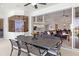 Screened-in waterfront patio with dining set and glimpses of the interior living spaces at 3615 Tripoli Blvd, Punta Gorda, FL 33950