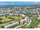Aerial view of condo complex surrounded by golf courses at 3640 Ironwood Cir # 302N, Bradenton, FL 34209