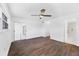 Spacious bedroom with wood-look flooring, ceiling fan, and plenty of closet space at 3640 Ironwood Cir # 302N, Bradenton, FL 34209