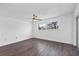 Bright bedroom with wood-look flooring, ceiling fan, and natural light at 3640 Ironwood Cir # 302N, Bradenton, FL 34209