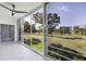 Spacious enclosed lanai with tile flooring and golf course view at 3640 Ironwood Cir # 302N, Bradenton, FL 34209
