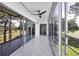 Enclosed lanai with ceiling fan overlooking the golf course at 3640 Ironwood Cir # 302N, Bradenton, FL 34209