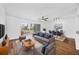 Open living room and dining area with hardwood floors and modern furnishings at 3640 Ironwood Cir # 302N, Bradenton, FL 34209