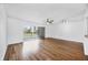 Bright living room with hardwood floors and sliding glass doors at 3640 Ironwood Cir # 302N, Bradenton, FL 34209