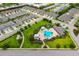 A beautiful aerial view of the community amenities showcasing the community pool, cabana, and common areas at 3673 Fescue Ln, Sarasota, FL 34232