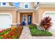 Charming townhome entrance with brick path and well-maintained landscaping at 3673 Fescue Ln, Sarasota, FL 34232