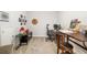 Bright office with neutral carpet featuring two desk spaces and art on the walls at 3673 Fescue Ln, Sarasota, FL 34232