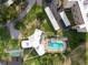 Aerial view of clubhouse with pool, shuffleboard and putting green at 3680 Ironwood Cir # 603L, Bradenton, FL 34209