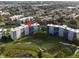 Aerial view of condo building on a green golf course at 3680 Ironwood Cir # 603L, Bradenton, FL 34209