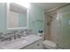 Bathroom featuring updated vanity and glass enclosed shower at 3680 Ironwood Cir # 603L, Bradenton, FL 34209