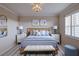 Stylish bedroom features a plush bed, modern lighting, and calming decor at 3680 Ironwood Cir # 603L, Bradenton, FL 34209