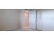 A view of a bedroom with a closet and door at 3680 Ironwood Cir # 603L, Bradenton, FL 34209
