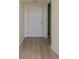 The entryway features laminate flooring and leads to other rooms in the condo at 3680 Ironwood Cir # 603L, Bradenton, FL 34209