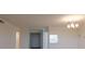 Entryway featuring neutral walls and trim, and updated chandelier at 3680 Ironwood Cir # 603L, Bradenton, FL 34209